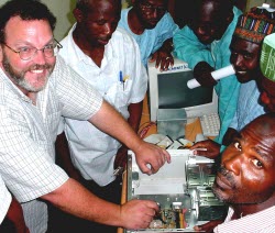 WiderNet founder Cliff Missen and students in Nigeria